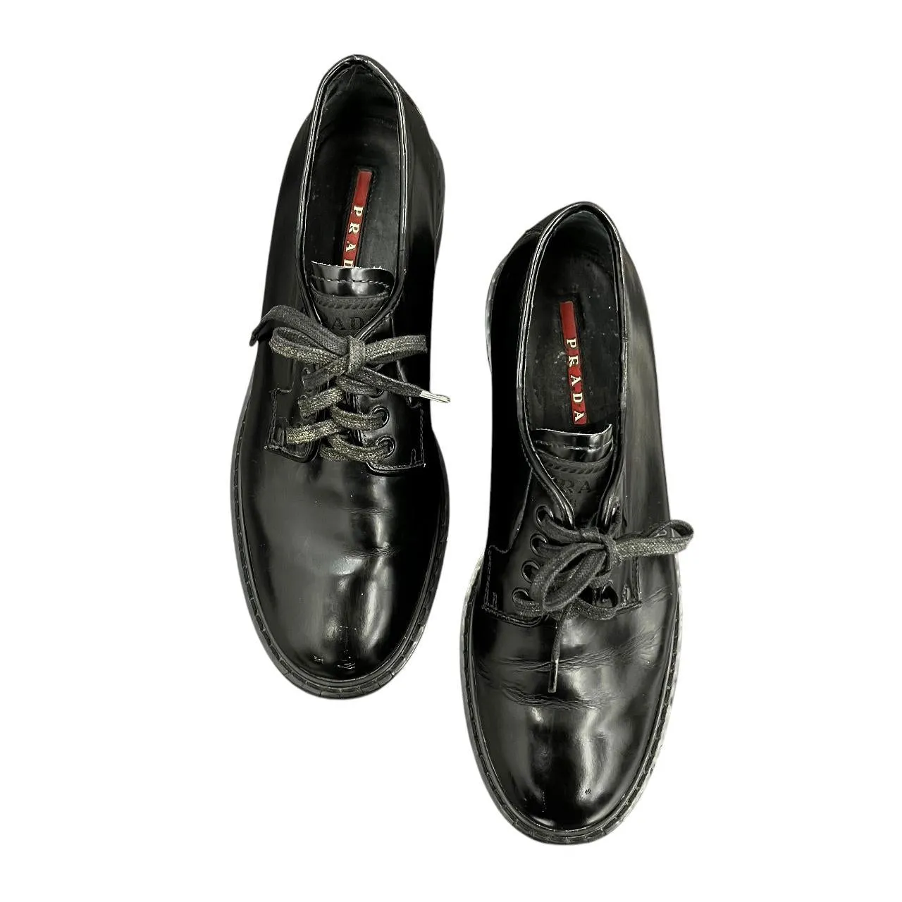 Prada black lace-up loafers